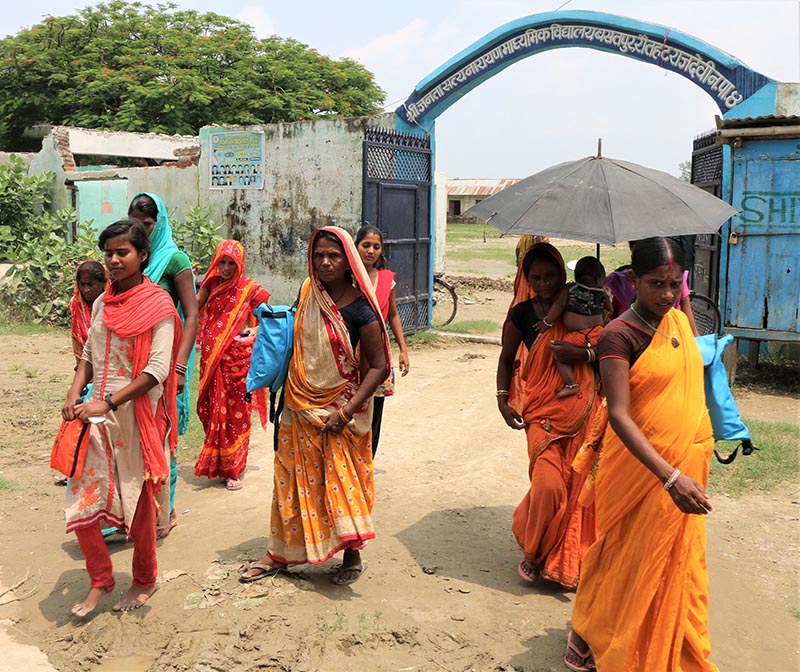 Women and girls on their way home after receiving Dignity Kits and Kishori Kits, in Rautahat, on Thursday, July 25, 2019. Photo: THT