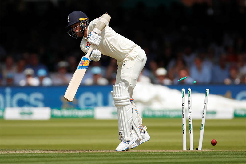 England's Olly Stone is bowled by Ireland's Mark Adair. Photo: Reuters