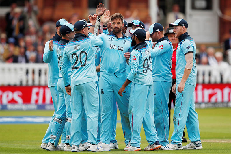 England's Liam Plunkett celebrates taking the wicket of New Zealand's Kane Williamson with team mates. Photo: Reuters