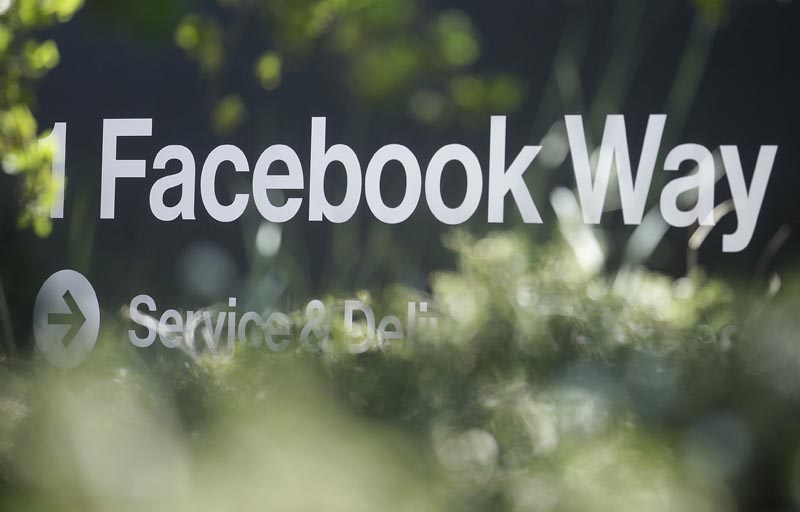 FILE - In this April 25, 2019, file photo an address sign for Facebook Way is shown in Menlo Park, California. Photo: AP