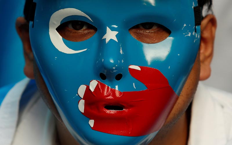 A Chinese Uyghur Muslim participates in an anti-China protest during the G20 leaders summit in Osaka, Japan June 28, 2019. Photo: REUTERS