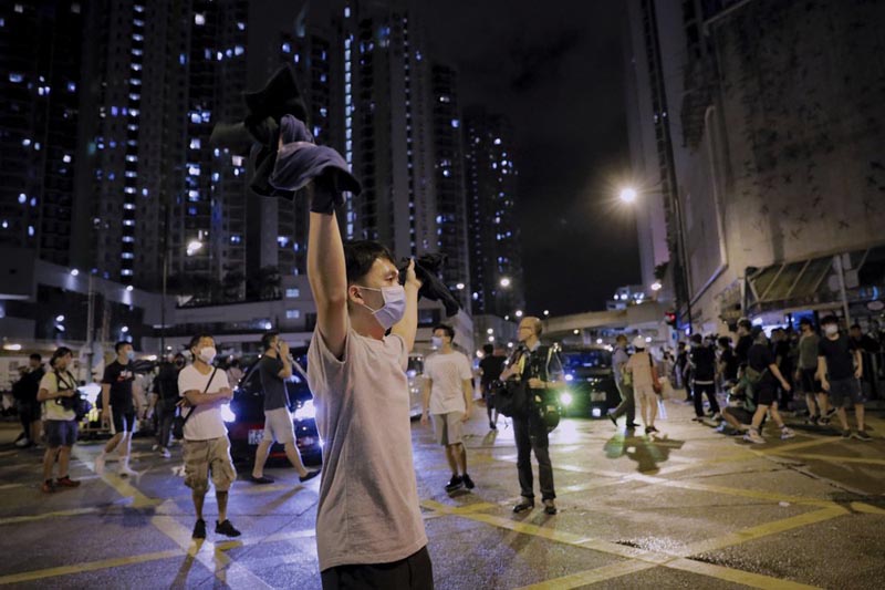 A protester gestures as hundreds of protesters gather near Kwai Chung police station in Hong Kong, Wednesday, July 31, 2019. Photo: AP