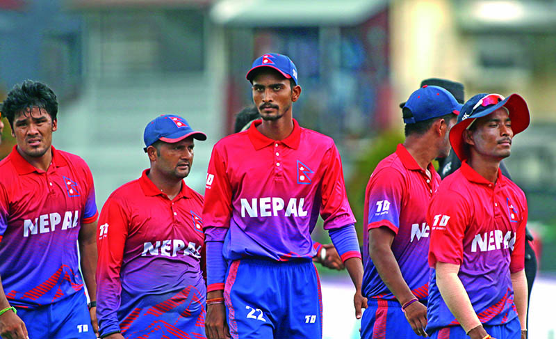 The dejected Nepal national cricket team members keaving the pitch during the ICC Twenty20 World Cup Asian Regional Finals Qualifier match against Qatar in Singapore on Tuesday. Photo Courtesy: CricketingNepal