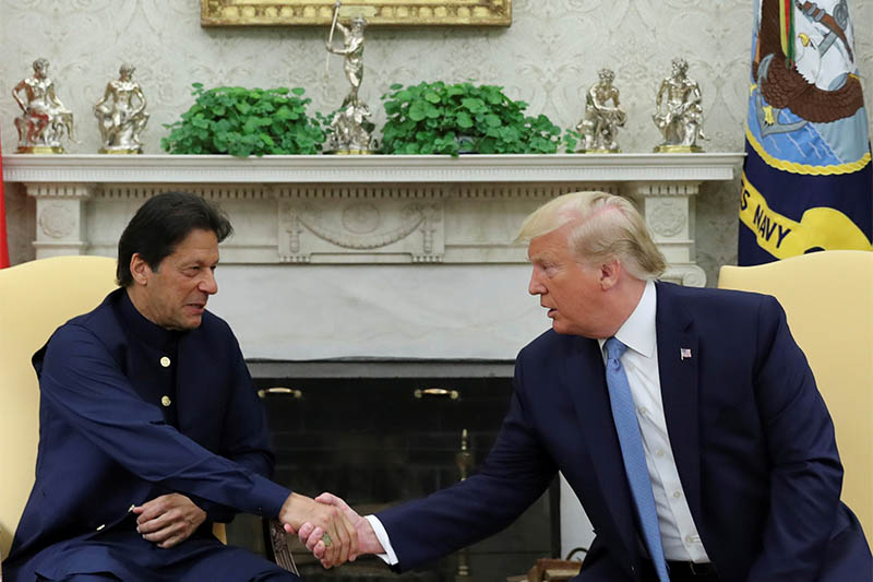 US President Donald Trump greets Pakistan's Prime Minister Imran Khan in the Oval Office at the White House in Washington, US, on Monday, July 22, 2019. Photo: Reuters