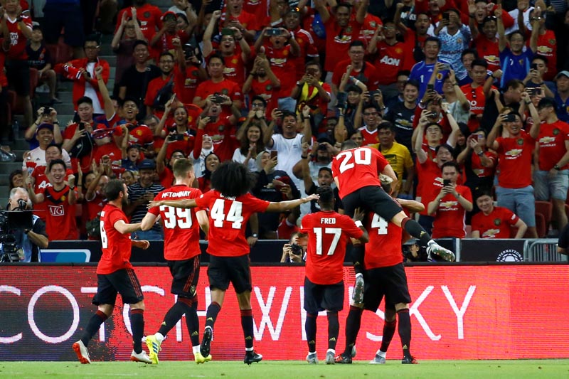 Manchester United's Mason Greenwood celebrates scoring their first goal with team mates during International Champions Cup match against Inter Milan at Singapore National Stadium, Singapore on July 20, 2019. Photo: Reuters