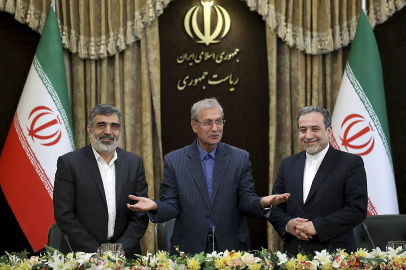 From left to right, spokesman for Iran's atomic agency Behrouz Kamalvandi, Iran's government spokesman Ali Rabiei and Iranian Deputy Foreign Minister Abbas Araghchi, attend a press briefing in Tehran, Iran, Sunday, July 7, 2019. Photo: AP