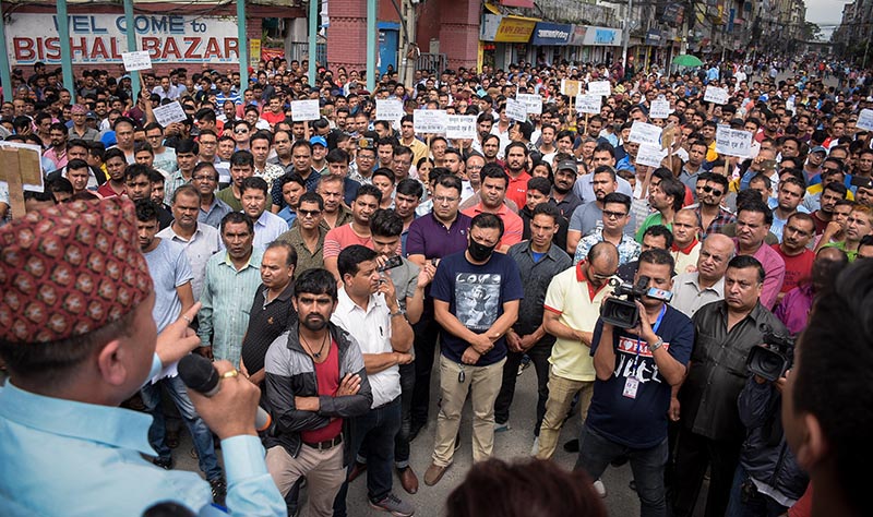 National Entrepreneurs Federation of Nepal members staging a demonstration against web-based VCTS, in New Road, on Friday, July 19, 2019. Photo: THT