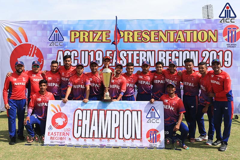 Nepali U-19 team lifting the trophy after winning ACC U-19 Eastern Region Cricket Tournament against Hong Kong at Kinrara Oval Stadium, in Kuala Lumpur, Malaysia on July 9, 2019. Photo Courtesy: asiancricket.org