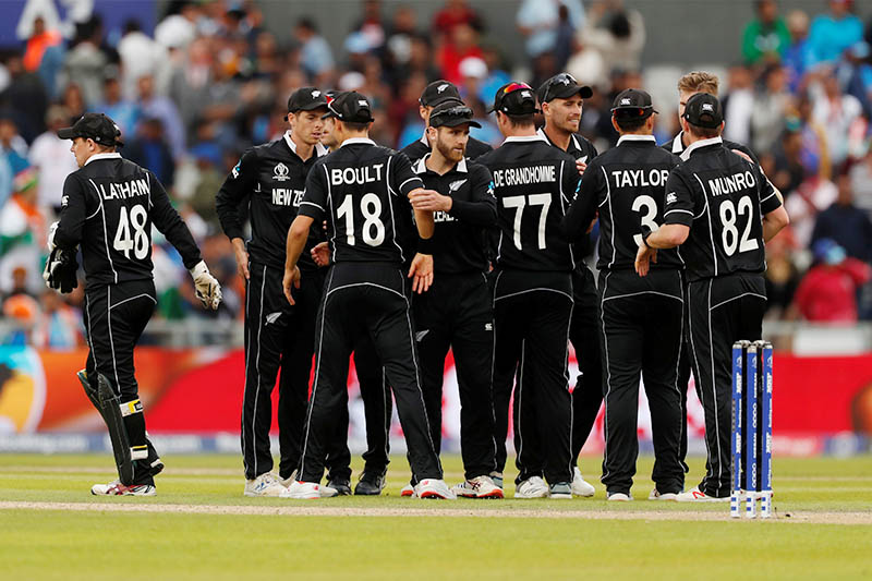 New Zealand's Kane Williamson and team mates celebrate after the match. Photo: Reuters