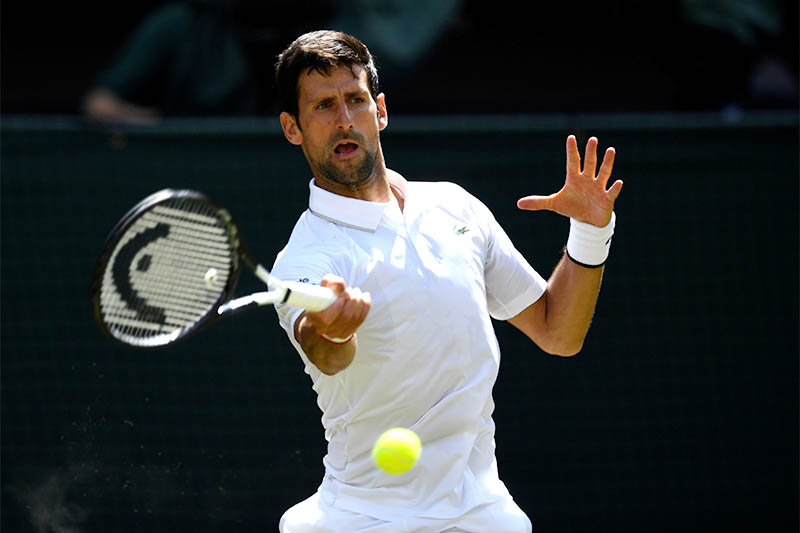 Serbia's Novak Djokovic in action during his first round match against Germany's Philipp Kohlschreiber. Photo: Reuters