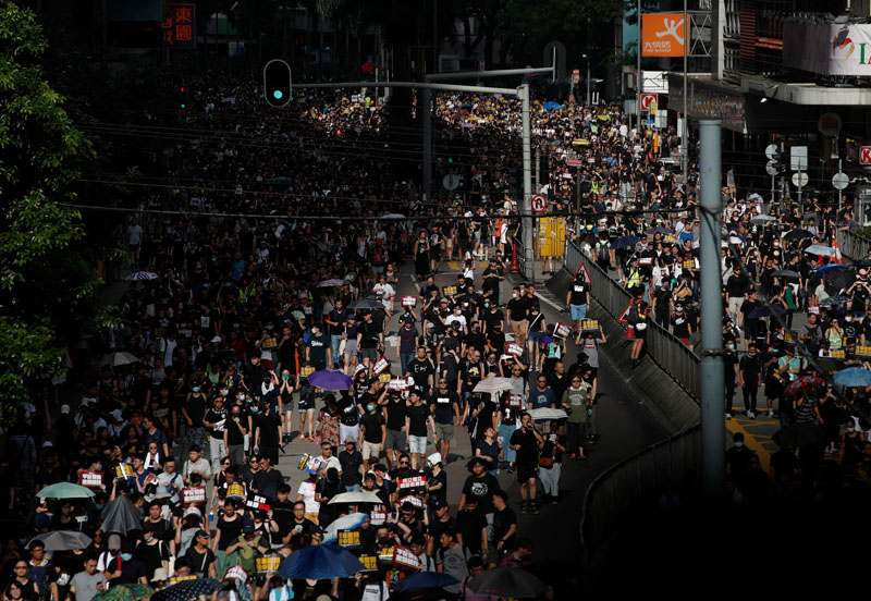 Anti-extradition demonstrators march to call for democratic reforms, in Hong Kong, China July 21, 2019. Photo: Reuters