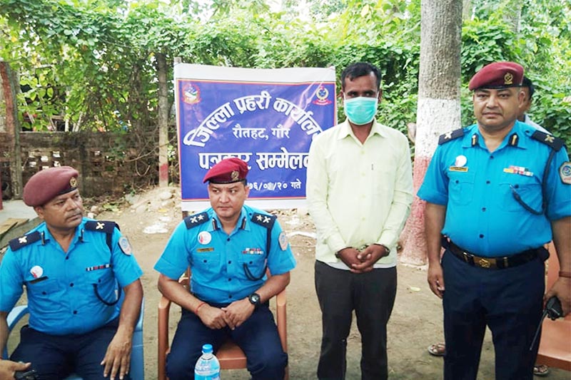 Police parade the man who allegedly killed his insured four-year-old daughter to claim double insurance amount, at the District Police Office in Rautahat district, on Friday, July 5, 2019. Photo: Prabhat Kumar Jha/THT