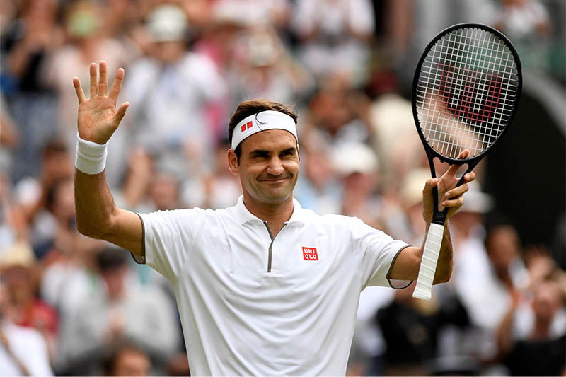 Switzerland's Roger Federer celebrates winning his third round match against France's Lucas Pouille. Photo: Reuters