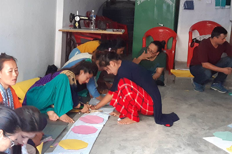 Women participate in sanitary pad making training organised by Chetana Community Sewing Centre in Byas Municipality-2 of Tanahun district, on Wednesday, July 31, 2019. Photo: Madan Wagle/THT