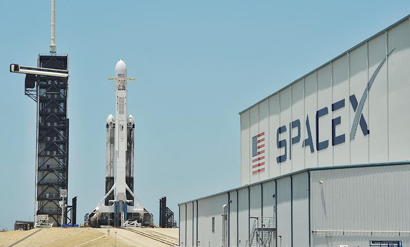 File -  A SpaceX Falcon Heavy rocket, carrying the U.S. Air Forceu2019s Space Test Program-2 mission, is shown during launch preparation at the Kennedy Space Center in Cape Canaveral, Florida, U.S., June 24, 2019. Photo: Reuters