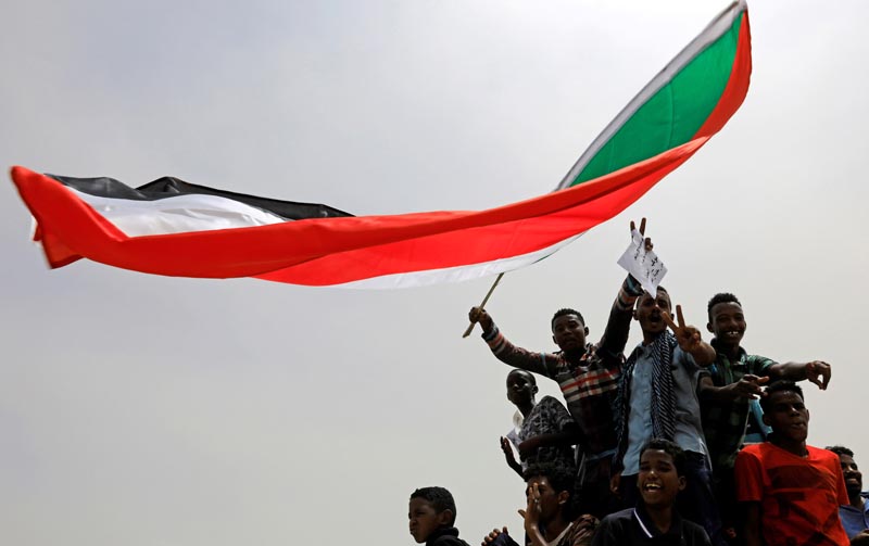 FILE PHOTO: Sudanese shout slogans during a demonstration demanding the ruling military hand over to civilians in Khartoum, Sudan, June 30, 2019. Photo: Reuters
