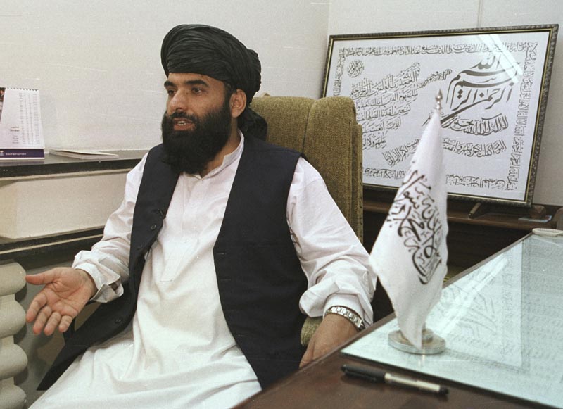 FILE - In this November 14, 2001 file photo, Suhail Shaheen, then Deputy Ambassador of the Islamic Republic of Afghanistan, gives an interview in Islamabad, Pakistan. Photo: AP