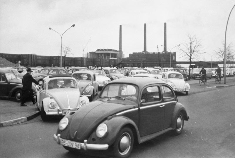 FILE - In this April 27, 1966 file photo, Volkswagen workers drive their Beetle cars from the parking lot on their way home at the end of a days work at the world's largest single auto plant, the Volkswagen factory (seen in background) in Wolfsburg, Germany. Photo: AP