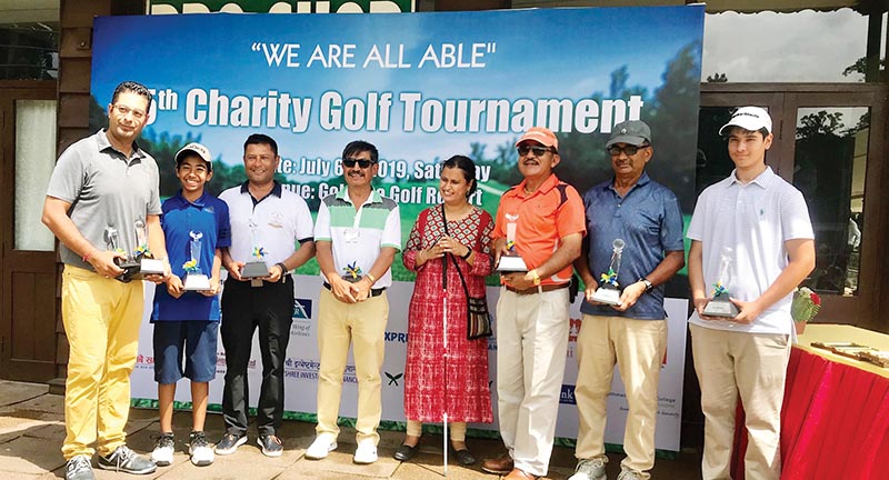 Winners of the We Are All Able Charity Golf Tournament with Ability Development Society of Nepal officials at the Gokarna Golf Club in Kathmandu on Saturday. Photo Courtesy: Gokarna Golf Club