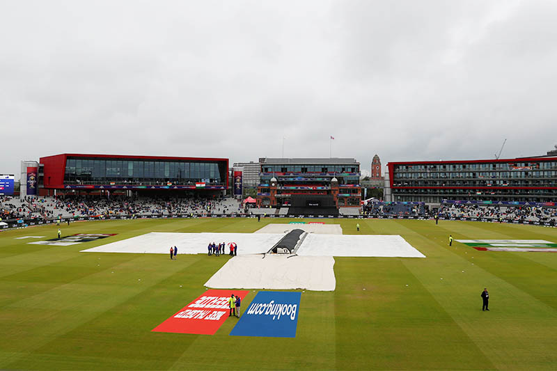 General view of the pitch as play is stopped due to rain. Photo: Reuters