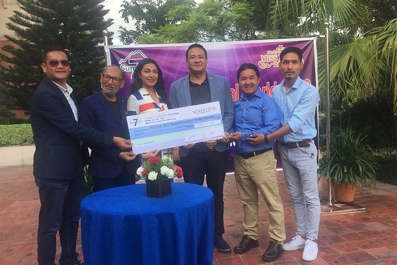 The 7 Summit Foundation hands over a cheque of USD 31,981 to Miss World Nepal 2019 Anushka Shrestha, in Kathmandu, on Saturday, August 24, 2019. The fund aims at providing educational and livelihood support to a remote village of Sindhupalchok district.