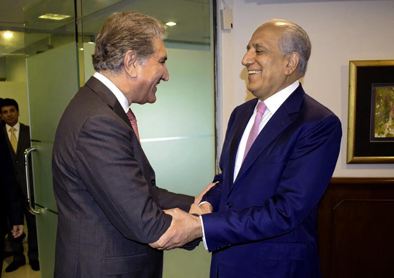 In this photo released by the Foreign Office, Pakistan's Foreign Minister Shah Mehmood Qureshi (left) receives US envoy Zalmay Khalilzad at the Foreign Ministry in Islamabad, Pakistan, Thursday, August 1, 2019. Photo: Pakistan Foreign Office via AP