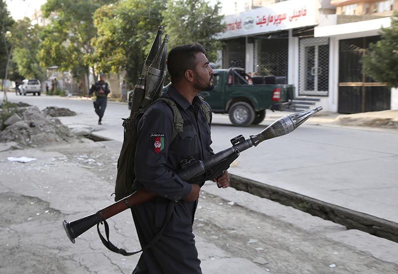 Afghan security personnel secure the site of a deadly attack in Kabul, Afghanistan, July 28, 2019. Photo: AP/File)