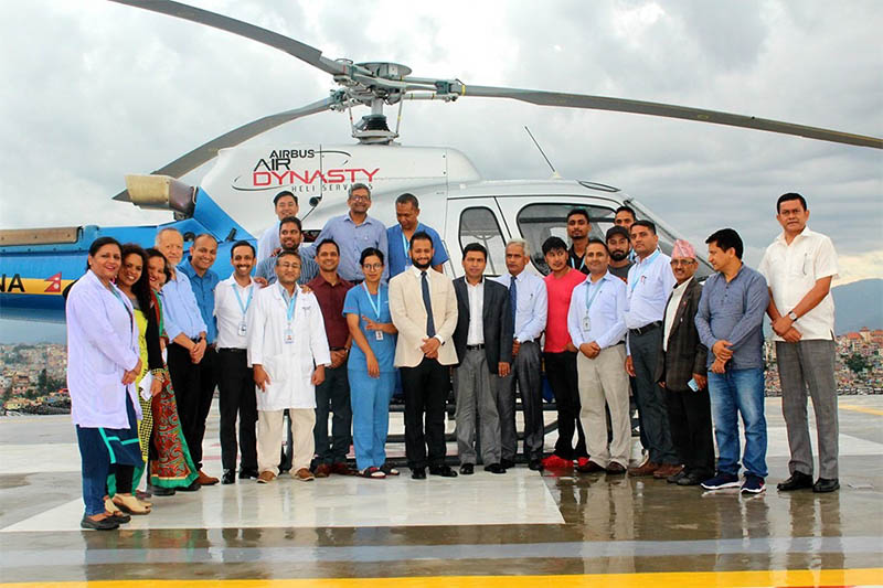 HAMS officials pose for a portrait after conducing a successful test flight on a newly built helipad. Courtesy: HAMS hospital