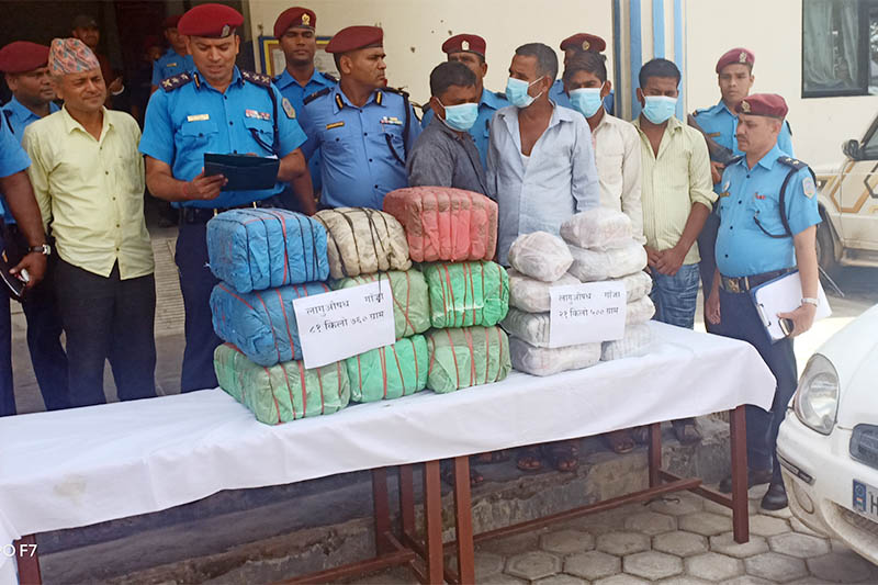 Police making alleged drug smugglers public along with the seized hashish at the District Police Office, in Hetauda, on Tuesday, August 20, 2019. Photo: Prakash Dahal/THT