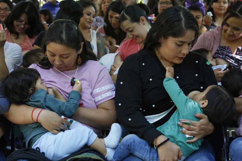 Mothers participate in the international breastfeeding minute, in Mexico City, Saturday, August 3, 2019. Photo: AP