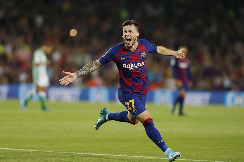 FC Barcelona's Carles Perez celebrates after scoring his side's third goal during the Spanish La Liga soccer match between FC Barcelona and Betis at the Camp Nou stadium in Barcelona, Spain, on Sunday, August 25, 2019. Photo: AP