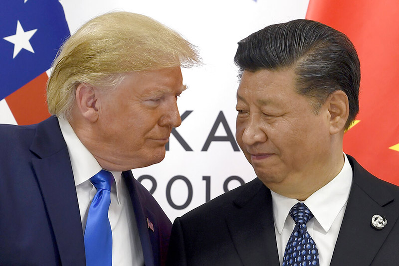 FILE - In this June 29, 2019 file photo, US President Donald Trump, left, meets with Chinese President Xi Jinping during a meeting on the sidelines of the G-20 summit in Osaka, Japan. China has announced it will raise tariffs on $75 billion of US products in retaliation for President Donald Trump's planned Sept 1 duty increase in a war over trade and technology policy. Photo: AP
