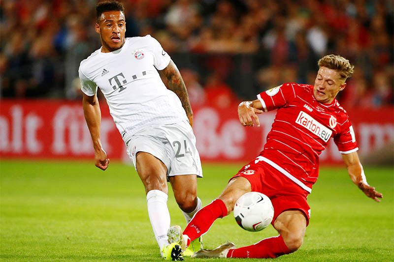 Bayern Munich's Corentin Tolisso sustains an injury in action with Energie Cottbus' Tobias Eisenhuth. Photo: Reuters