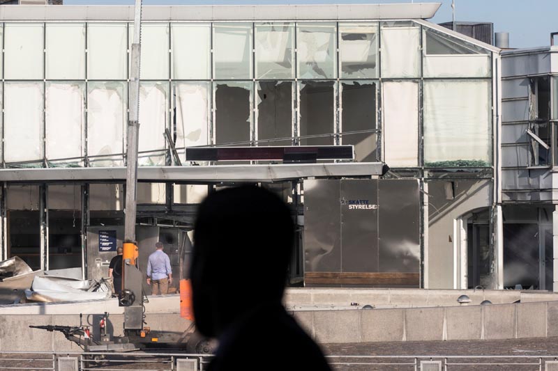 Damaged facade is seen at the Tax Authority building at Oesterbro, where an explosion occurred near Nordhavn Station, in Copenhagen, Denmark, August 7, 2019. Photo: Olafur Steinar Rye Gestsson/Ritzau Scanpix/via Reuters