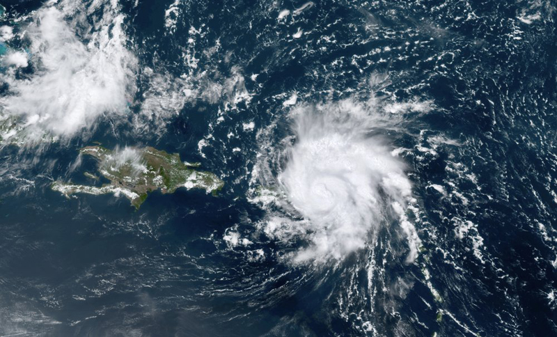 This GOES-16 satellite image taken Wednesday, August 28, 209, at 17:20 UTC and provided by National Oceanic and Atmospheric Administration (NOAA), shows Dorian, a Category 1 hurricane, crossing over the US and British Virgin Islands.