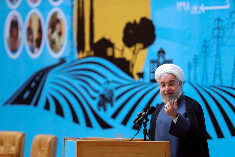 Iranian President Hassan Rouhani gestures as he delivers a speech during the Conference of Governmentu0092s Achievements in Developing Rural Infrastructure in Tehran, Iran, on Monday, August 26, 2019. Photo: Official Presidential website/Handout via Reuters