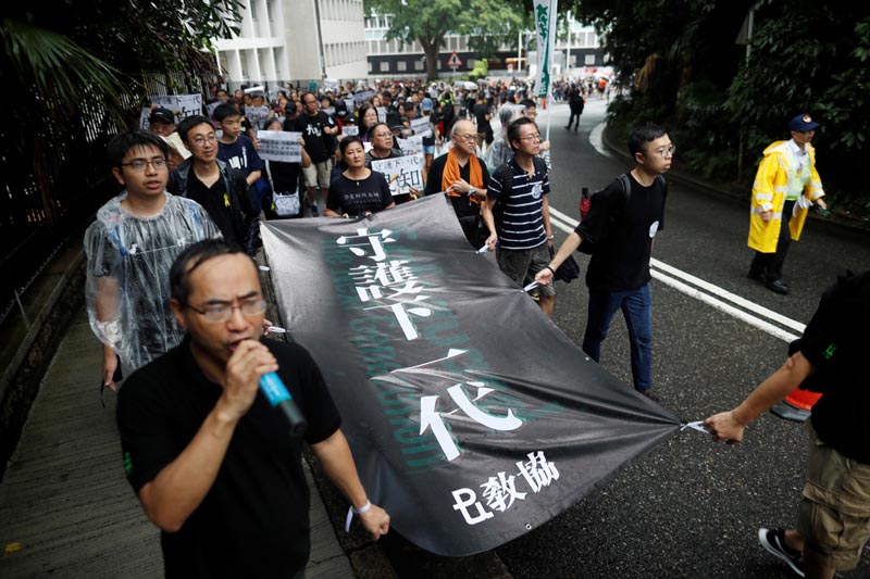 Teachers protest against the extradition bill during a rally organised by Hong Kong Professional Teachers' Union in Hong Kong, China August 17, 2019. Photo: Reuters