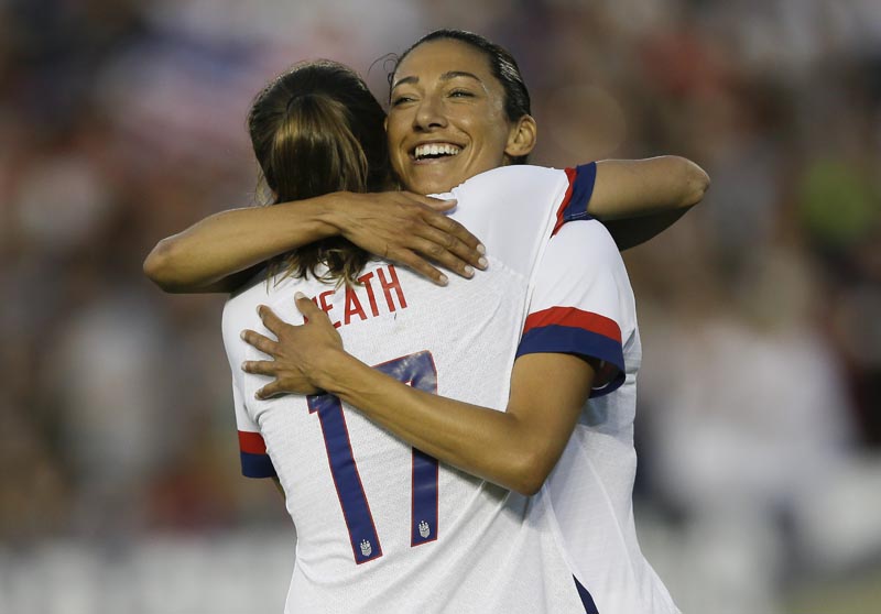 US forward Christen Press hugs forward Tobin Heath (left) for Heath's goal against Ireland during the first half of an international friendly soccer match in Pasadena, California, Saturday, August 3, 2019. Photo: AP