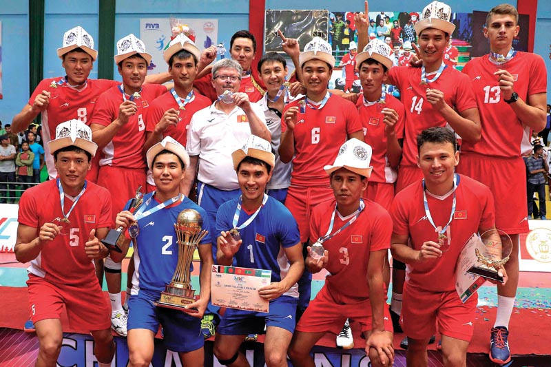 Players and officials of Kyrgyzstan celebrate after winning the AVC Asian Senior Menu0092s Central Zone Volleyball Championship in Lalitpur on Saturday, August 24, 2019. Photo: Udipt Singh Chhetry/ THT