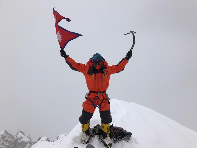 Mingma David on the summit of Gasherbrum I.