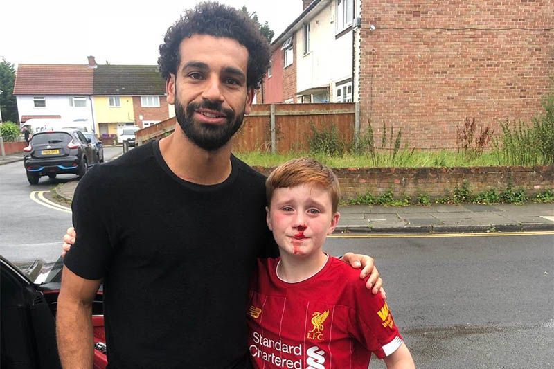 Liverpool's forward Mohamed Salah poses for a portrait with a fan, who injured his nose while waving to his star striker, in Liverpool, on Sunday, August 11, 2019. Courtesy: Joe Cooper/Twitter