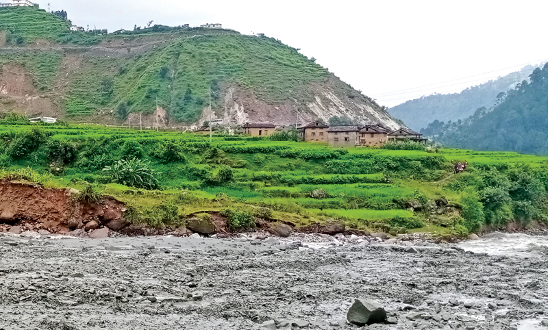 A view of settlement at Gadkhet tole, which faces risk of inundation due to erosion of lands by rivers, in Bajura, on Thursday. Photo/ THT