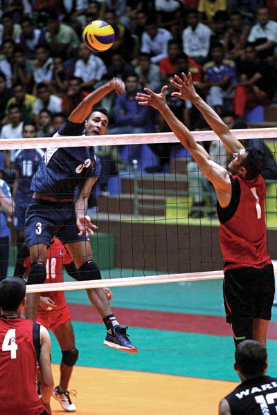 Nepalu0092s Hari Adhikari jumps for a spike against Afghanistan during their friendly match in Lalitpur on Thursday, August 15, 2019. Photo: Udipt Singh Chhetry / THT