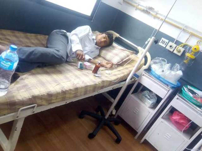 Niraj Sharma, 15, a patient of blood cancer, lies down on a bed while he receives treatment at Bhaktapur Cancer Hospital. Photo: Dinesh Shrestha/THT