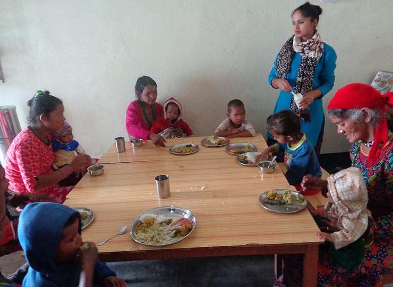 Children admitted to Nutrition Rehabilitation Centre being fed with nutritious food in Dadeldhura Hospital, on Wednesday.u00a0 Photo: THT
