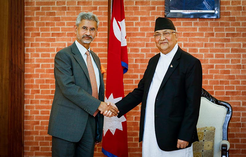 Prime Minister KP Sharma Oli and Indian Minister of External Affairs S Jaishankar shaking hands during a meeting, in Kathmandu, on Wednesday. Photo: THT