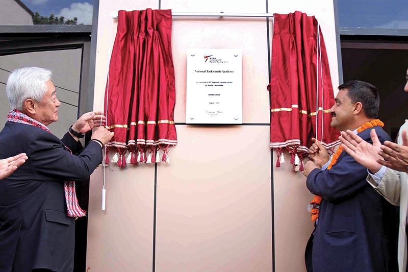 WT President Chungwon Choue (left) and NSC Member Secretary Ramesh Silwal Inaugurating the Regional Training Centre in Lalitpur on Monday. Photo: THT