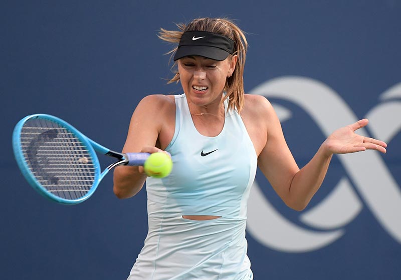 Maria Sharapova (Russia) hits the ball against Anett Kontaveit (Estonia) during the Rogers Cup tennis tournament at Aviva Centre, in Toronto, Ontario, Canada, on Aug 5, 2019. Mandatory Credit: Dan Hamilton-USA TODAY Sports via Reuters