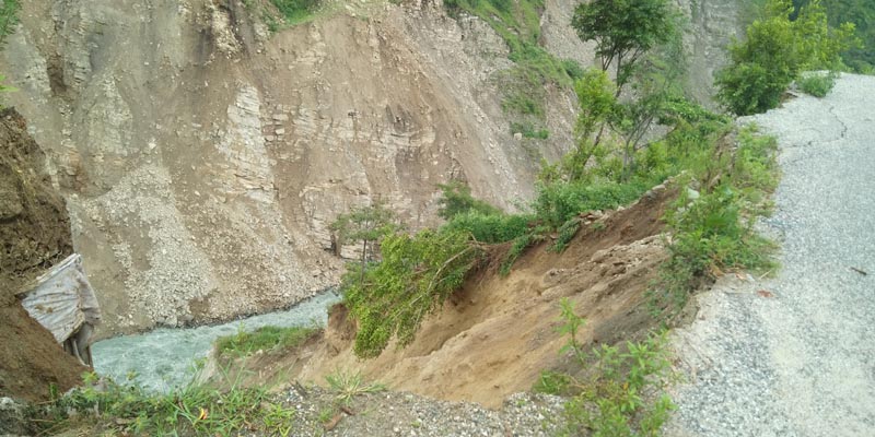 Landslide at Amalkot along the Sanfe-Martadi road section of Bajura district, on Sunday, August 11, 2019. Photo: Prakash Singh/THT