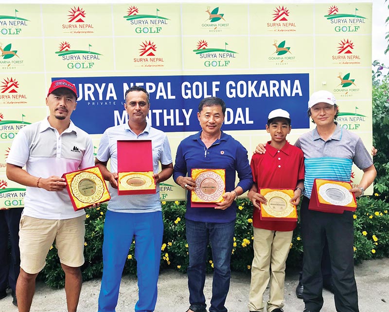 (From left) Tashi Dong, Pradhumna Simkhada, Purna Bahadur Rai, Sadbhav Acharya and Phintso Ongdi Lama after the Surya Nepal Gokarna Monthly Medal at the Gokarna Golf Club in Kathmandu on Saturday. Photo: THT